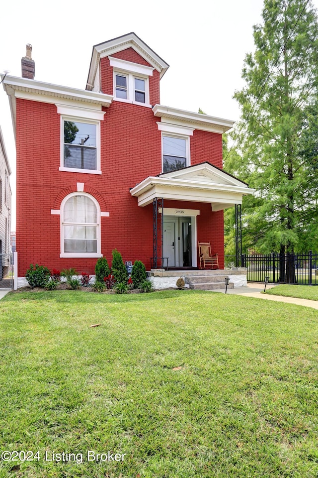 2935 S 3rd St, Louisville, KY 40208 - view of front of property with brick siding, a porch, and a chimney