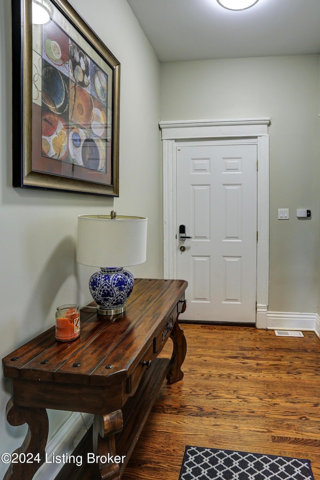2935 S 3rd St, Louisville, KY 40208 - foyer entrance featuring wood finished floors and baseboards