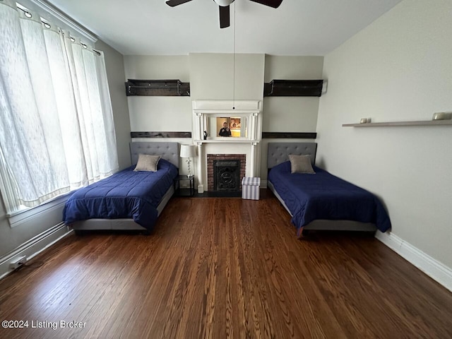 2935 S 3rd St, Louisville, KY 40208 - bedroom with multiple windows, baseboards, and wood finished floors