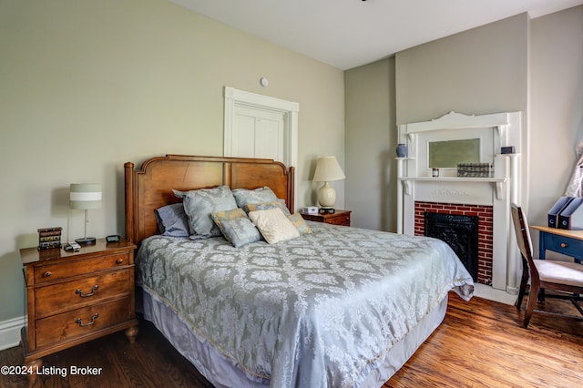 2935 S 3rd St, Louisville, KY 40208 - bedroom with wood finished floors and a fireplace