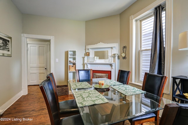 2935 S 3rd St, Louisville, KY 40208 - dining room with dark wood-style flooring and baseboards