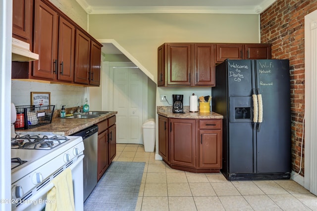 2935 S 3rd St, Louisville, KY 40208 - kitchen with black refrigerator with ice dispenser, under cabinet range hood, dishwasher, white gas range, and brick wall