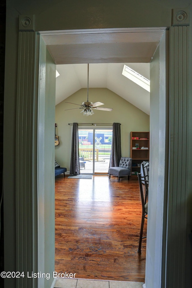 2935 S 3rd St, Louisville, KY 40208 - hall featuring a skylight, wood finished floors, and vaulted ceiling