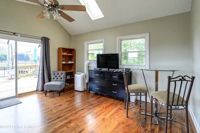 2935 S 3rd St, Louisville, KY 40208 - living area with vaulted ceiling, wood finished floors, ceiling fan, and a skylight