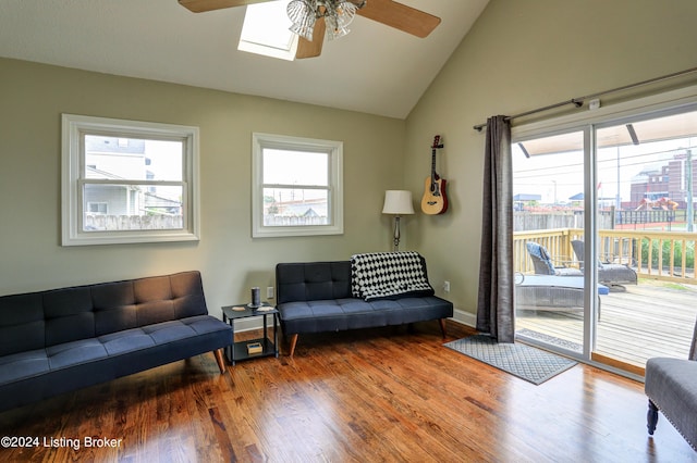 2935 S 3rd St, Louisville, KY 40208 - living area featuring a ceiling fan, wood finished floors, and high vaulted ceiling