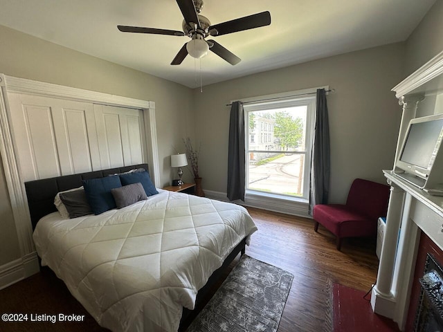 2935 S 3rd St, Louisville, KY 40208 - bedroom with dark wood-style floors and a ceiling fan