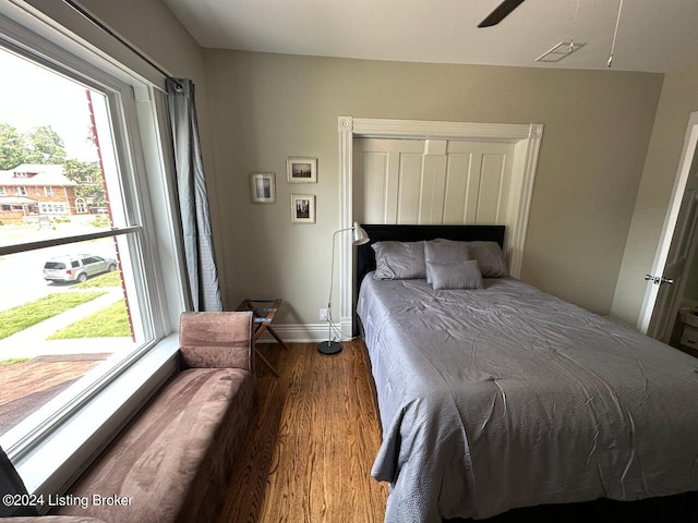 2935 S 3rd St, Louisville, KY 40208 - bedroom featuring wood finished floors, baseboards, a closet, and a ceiling fan