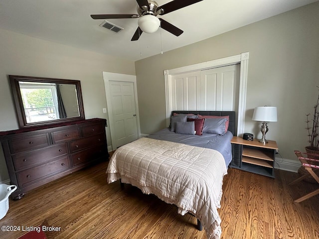 2935 S 3rd St, Louisville, KY 40208 - bedroom with wood finished floors, baseboards, a closet, and ceiling fan