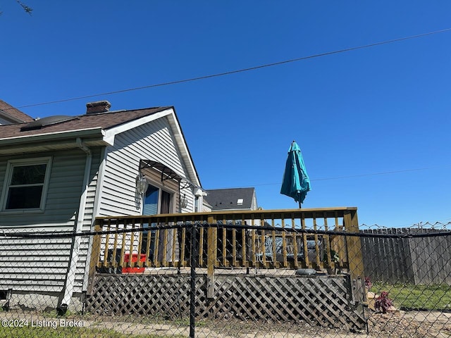 2935 S 3rd St, Louisville, KY 40208 - view of side of home with fence and a deck