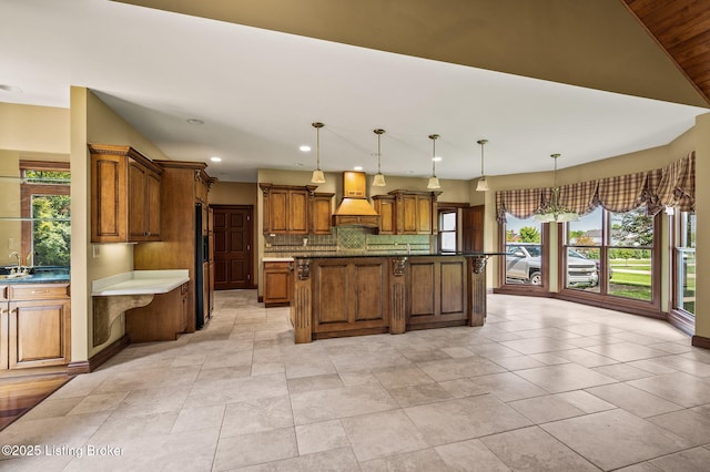 2913 Harrods Crossing Blvd, Crestwood, KY 40014 - kitchen with healthy amount of natural light, tasteful backsplash, brown cabinetry, black fridge, and recessed lighting