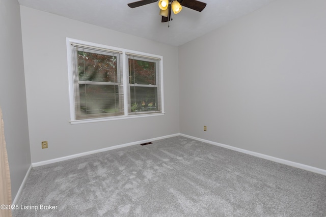 3553 Terrier Ln, Louisville, KY 40218 - empty room featuring carpet flooring, a ceiling fan, and baseboards