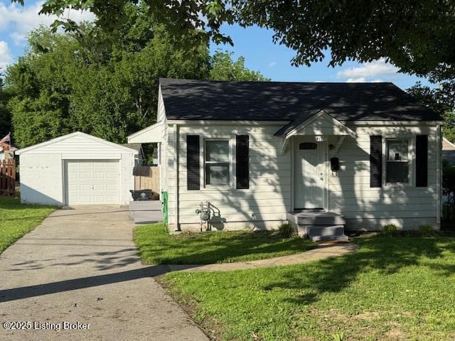 4177 Sherman Ave, Louisville, KY 40213 - bungalow-style house with an outbuilding, driveway, a front yard, and a shingled roof