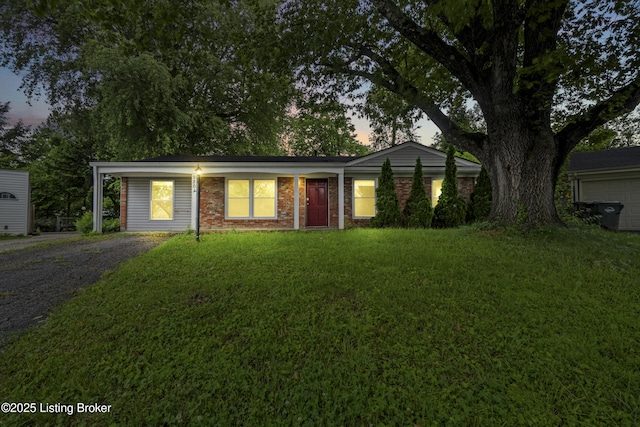 9201 Walhampton Ct, Louisville, KY 40242 - single story home with a front lawn and brick siding