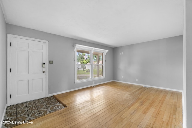 9201 Walhampton Ct, Louisville, KY 40242 - foyer entrance with wood-type flooring and baseboards