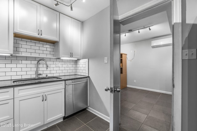 9201 Walhampton Ct, Louisville, KY 40242 - kitchen with a sink, stainless steel dishwasher, a wall mounted air conditioner, rail lighting, and white cabinetry