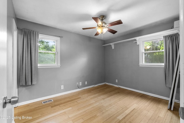 9201 Walhampton Ct, Louisville, KY 40242 - unfurnished room featuring a ceiling fan, hardwood / wood-style flooring, and baseboards