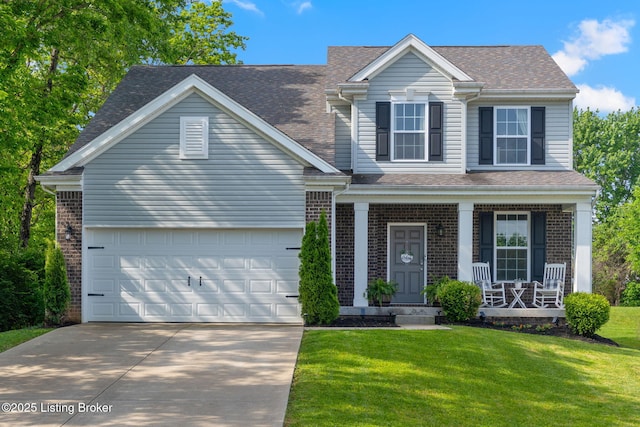 2000 Meadows Edge Ln, Louisville, KY 40245 - view of front facade featuring a porch, driveway, a garage, and a front lawn