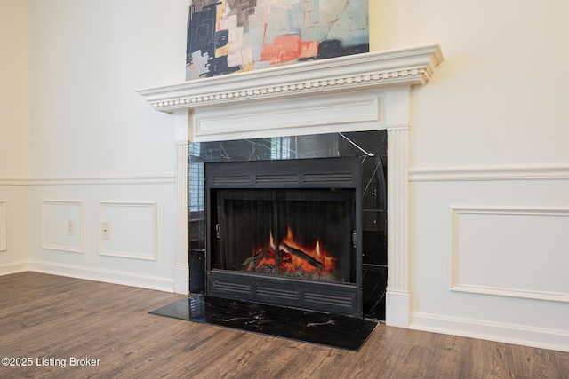3809 Chamberlain Ln Unit C, Louisville, KY 40241 - detailed view of wood finished floors, a lit fireplace, and baseboards