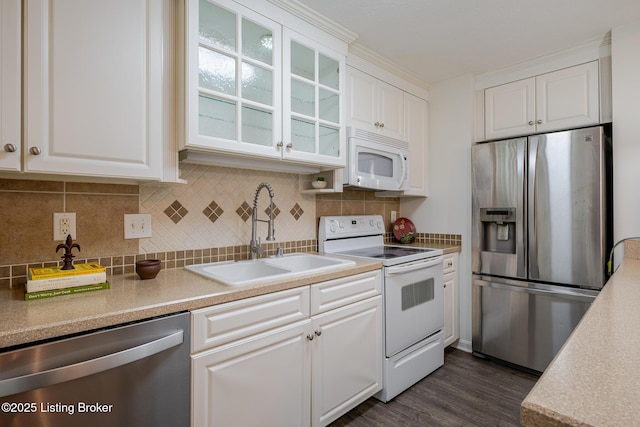 3809 Chamberlain Ln Unit C, Louisville, KY 40241 - kitchen with stainless steel appliances, a sink, white cabinets, and light countertops