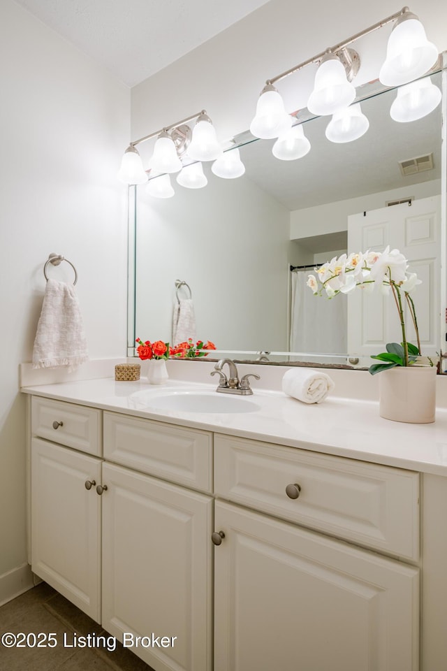 3809 Chamberlain Ln Unit C, Louisville, KY 40241 - bathroom featuring vanity and tile patterned floors