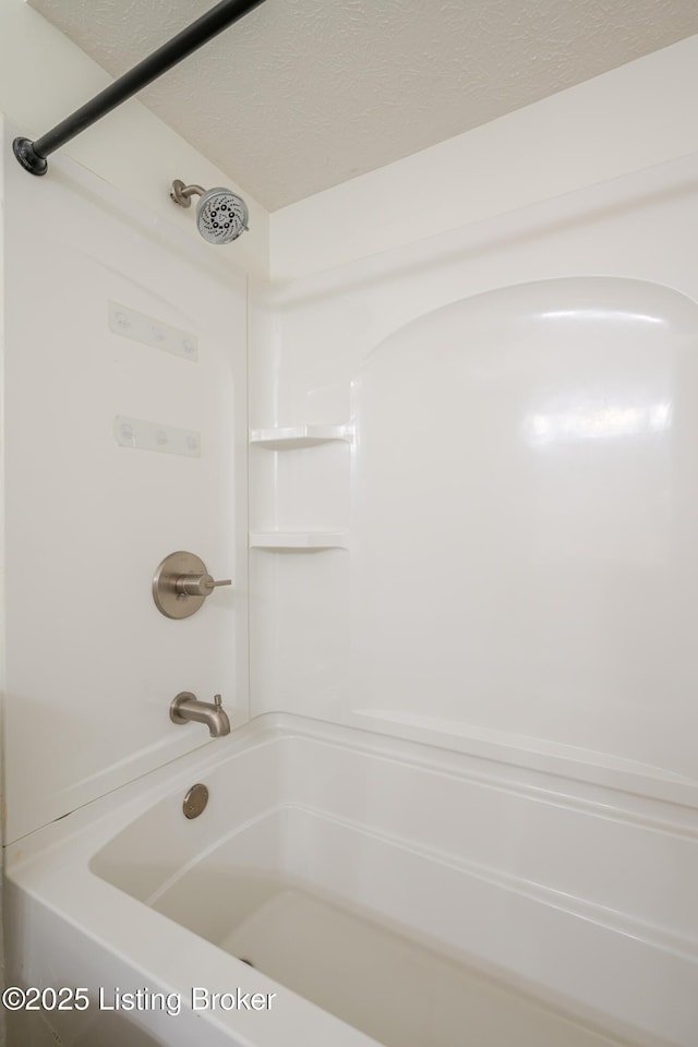 3809 Chamberlain Ln Unit C, Louisville, KY 40241 - bathroom with a textured ceiling and bathtub / shower combination