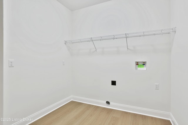 449 S Stallard Dr, Shelbyville, KY 40065 - clothes washing area featuring light wood-style floors, hookup for a washing machine, baseboards, and electric dryer hookup
