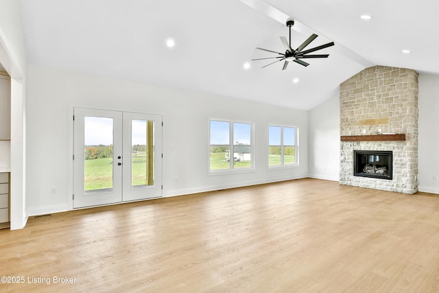 449 S Stallard Dr, Shelbyville, KY 40065 - unfurnished living room with lofted ceiling, a ceiling fan, wood finished floors, french doors, and a stone fireplace