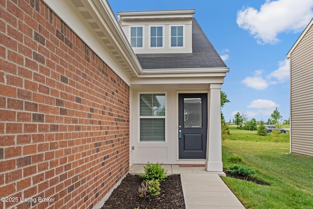 124 Exploration Path, Shelbyville, KY 40065 - doorway to property featuring a lawn, brick siding, and a shingled roof