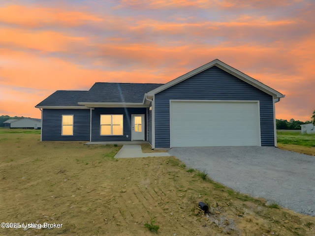 4985 Salt River Rd, Leitchfield, KY 42754 - view of front of house with dirt driveway and an attached garage