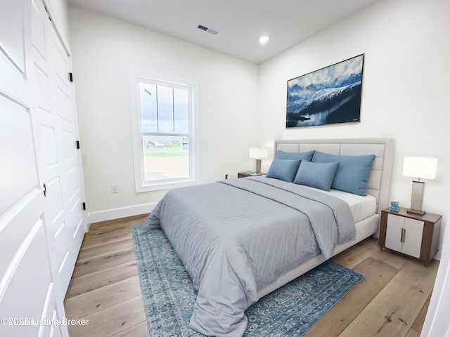 4985 Salt River Rd, Leitchfield, KY 42754 - bedroom featuring light wood-style floors, baseboards, and recessed lighting