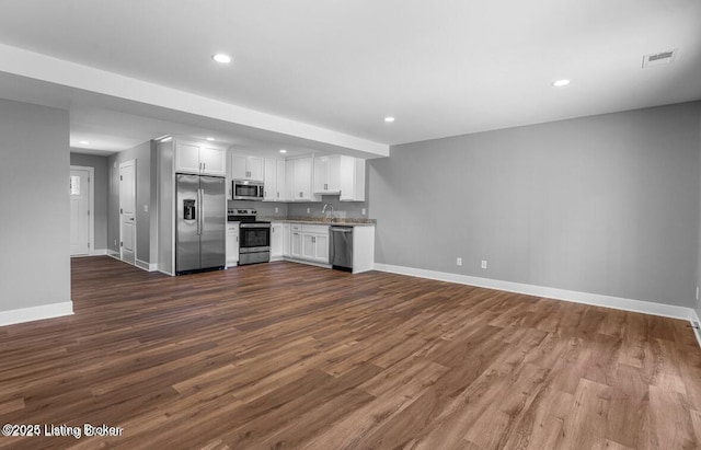 114 N Elm Grove Ave, Bardstown, KY 40004 - kitchen with stainless steel appliances, baseboards, dark wood-style flooring, white cabinets, and recessed lighting
