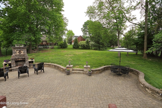 6211 Perrin, Crestwood, KY 40014 - view of patio / terrace featuring an outdoor stone fireplace