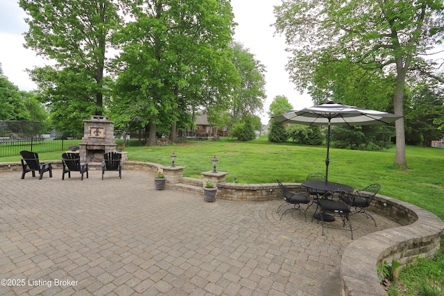 6211 Perrin, Crestwood, KY 40014 - view of patio featuring an outdoor stone fireplace and outdoor dining area