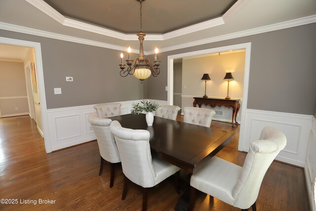 6211 Perrin, Crestwood, KY 40014 - dining room with a chandelier, wainscoting, a tray ceiling, dark wood-style flooring, and crown molding