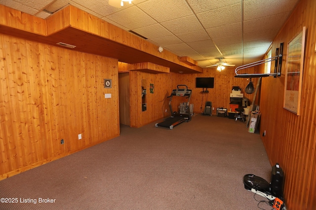 6211 Perrin, Crestwood, KY 40014 - exercise area featuring a ceiling fan, wood walls, and carpet flooring
