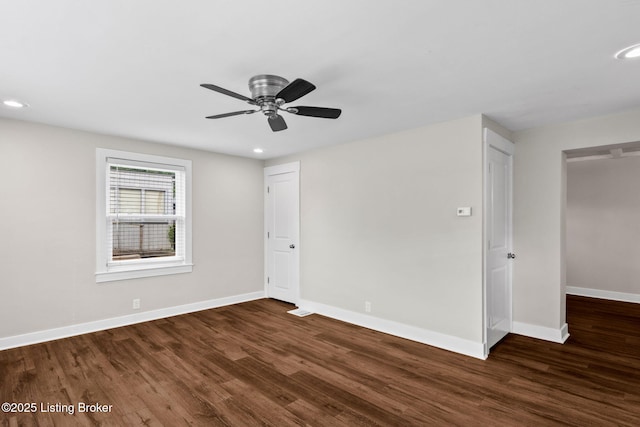 spare room with wood finished floors, baseboards, recessed lighting, and ceiling fan