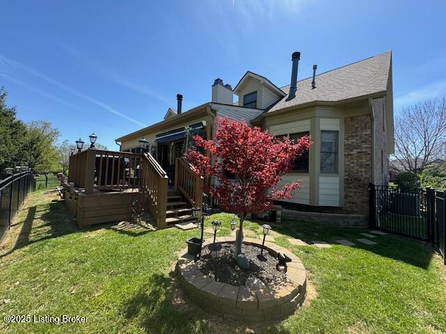 10606 Black Iron Rd, Louisville, KY 40291 - rear view of property featuring a wooden deck and brick siding