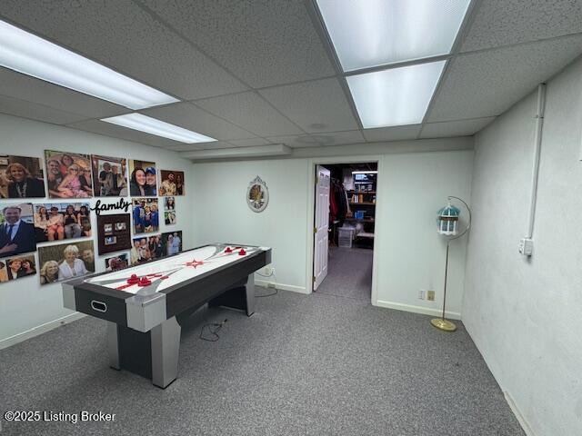 10606 Black Iron Rd, Louisville, KY 40291 - game room with a paneled ceiling, carpet, and baseboards