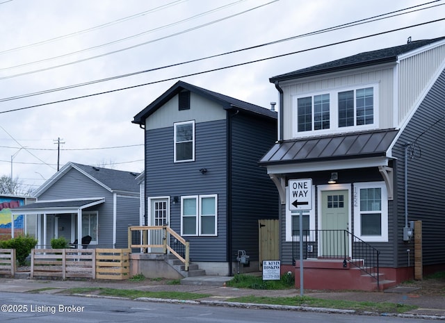 1254 S Preston St, Louisville, KY 40217 - view of front facade featuring a standing seam roof and metal roof
