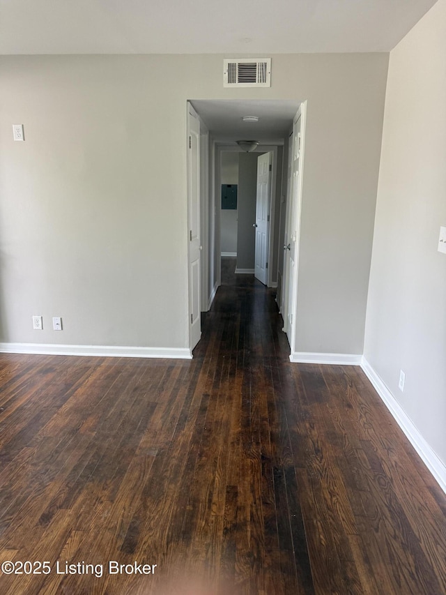 254 Greenbriar Ln, Louisville, KY 40229 - empty room with baseboards and dark wood-style flooring