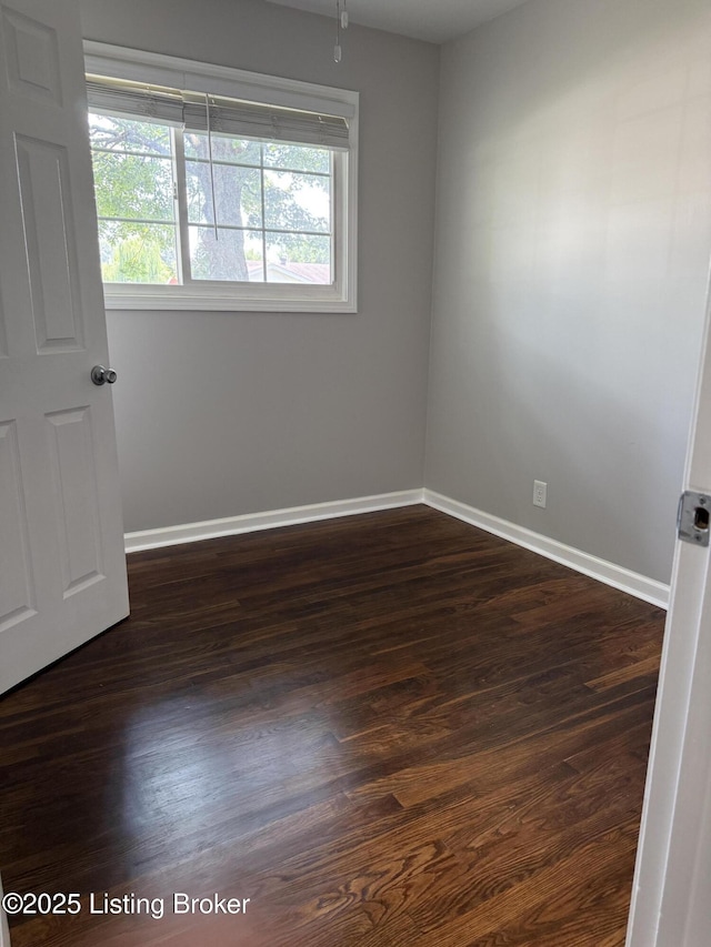 254 Greenbriar Ln, Louisville, KY 40229 - spare room with dark wood finished floors and baseboards