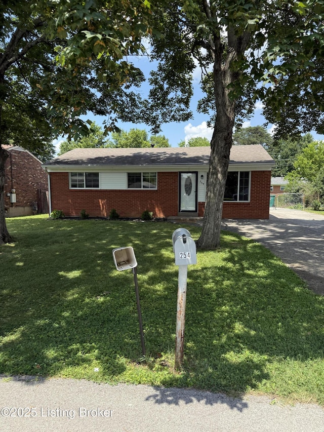 254 Greenbriar Ln, Louisville, KY 40229 - single story home featuring brick siding, a front yard, and driveway