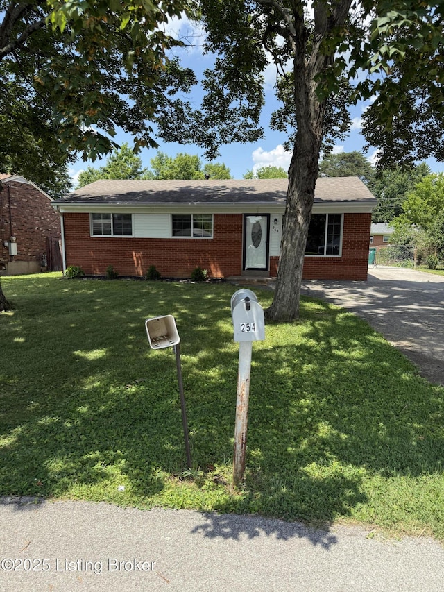 254 Greenbriar Ln, Louisville, KY 40229 - single story home with brick siding and a front lawn