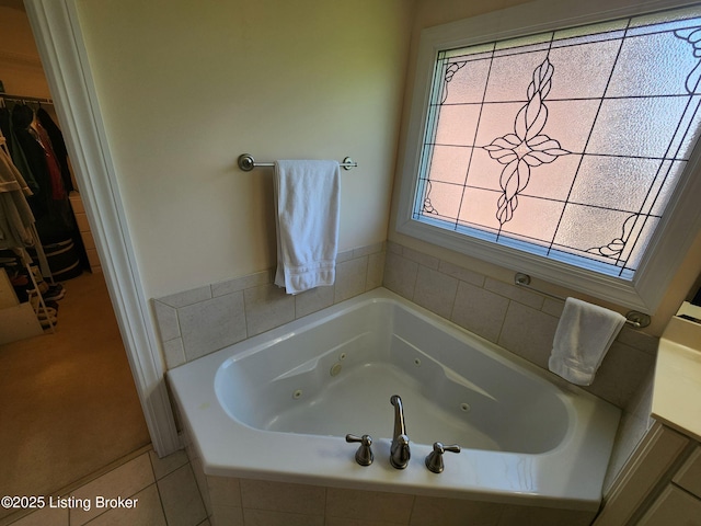 7201 Creekton Dr, Louisville, KY 40241 - bathroom featuring a tub with jets and a walk in closet