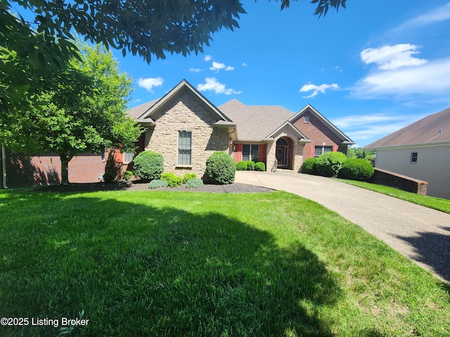 7201 Creekton Dr, Louisville, KY 40241 - view of front of property featuring stone siding, a front lawn, and concrete driveway