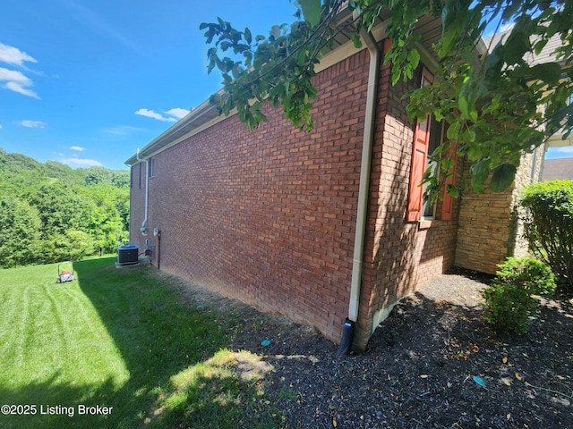 7201 Creekton Dr, Louisville, KY 40241 - view of side of property featuring a lawn, brick siding, and central AC