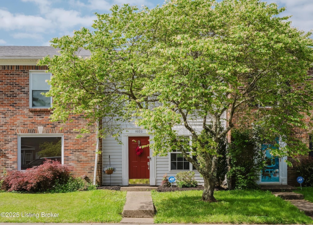6020 Concord Ave, Crestwood, KY 40014 - view of property hidden behind natural elements with a front lawn and brick siding