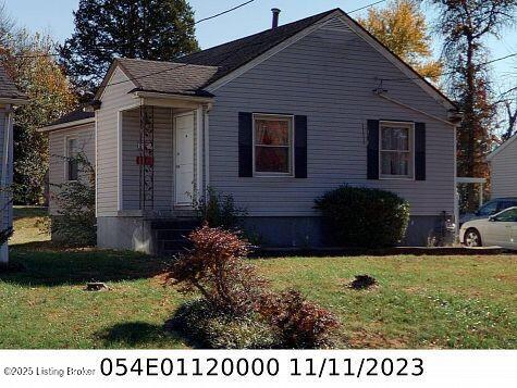 4727 Cliff Ave, Louisville, KY 40215 - bungalow-style house with a front lawn