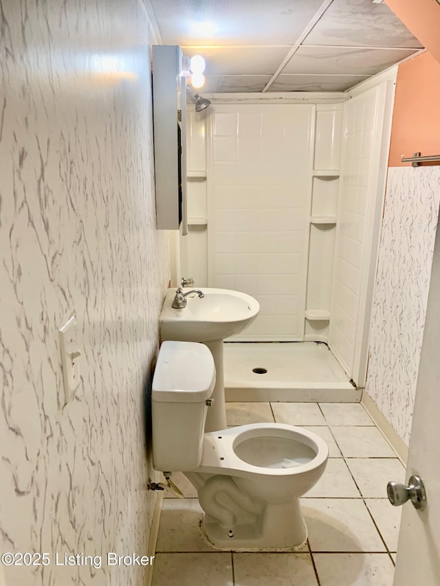 4727 Cliff Ave, Louisville, KY 40215 - bathroom with toilet, a shower stall, and tile patterned floors