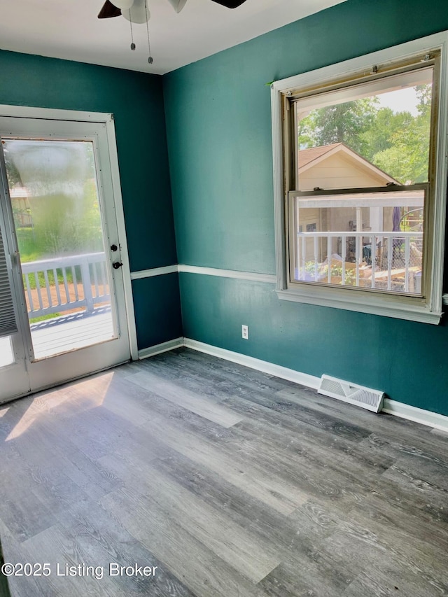 4727 Cliff Ave, Louisville, KY 40215 - unfurnished room featuring ceiling fan, wood finished floors, and baseboards